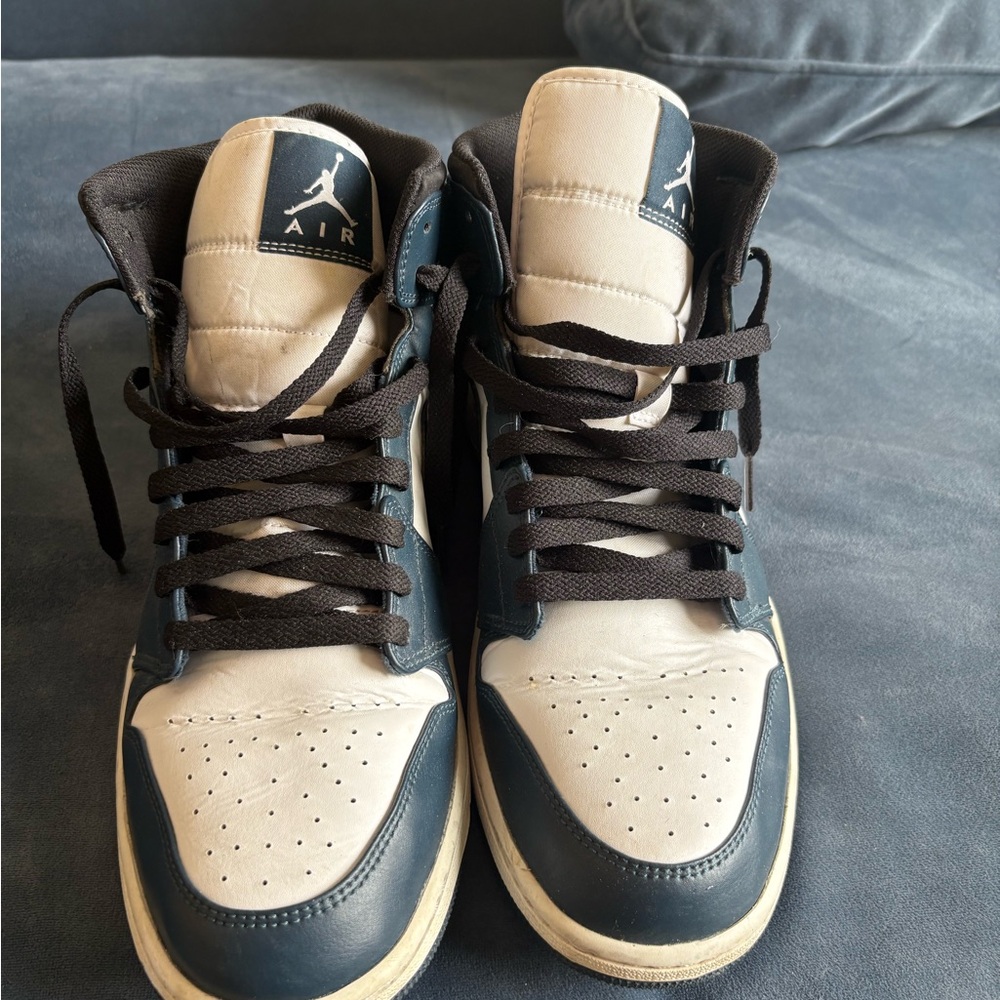 Jordan’s Teal & White Mid’s Sneakers